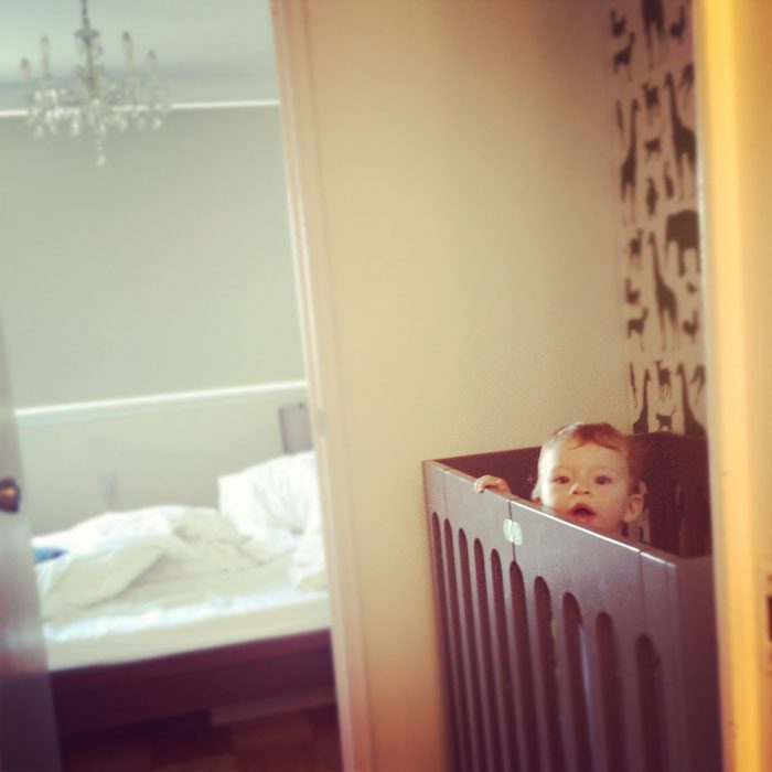 Baby in a mini-crib