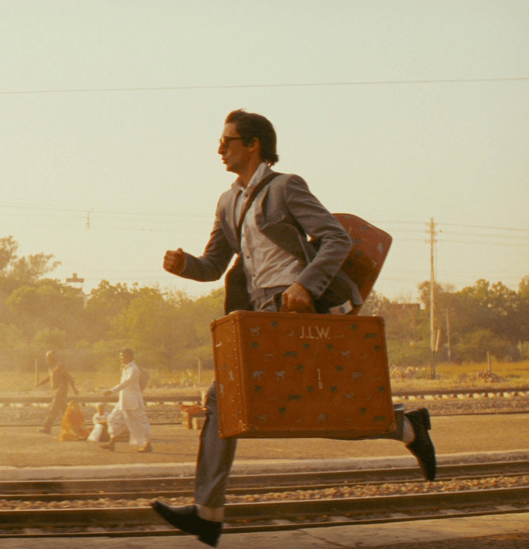 Man running with a Suitcase