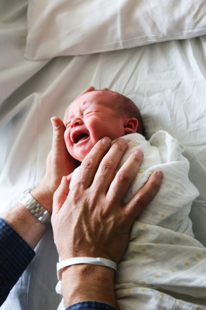 Holding a newborn-HitherAndThither-1-2
